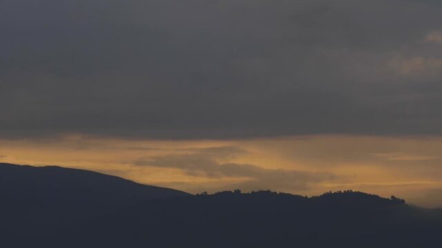 Moody dark cloud descending over entoto mountains in ethiopia, this shot is good for feature film during dark hours or start night.