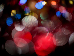 Christmas lights colorful bokeh background. Holiday festive atmosphere