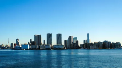 Foto op Plexiglas 快晴の東京湾を臨む東京のビル群 © ToYoPHoTo