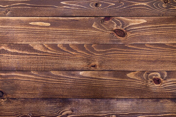 New brown wood background made of dark natural wood in grunge style. The view from the top. Natural...