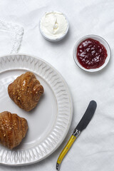 French Homemade fresh croissants with jam and butter