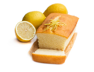 Homemade lemon loaf decorated with lemon zest isolated on white