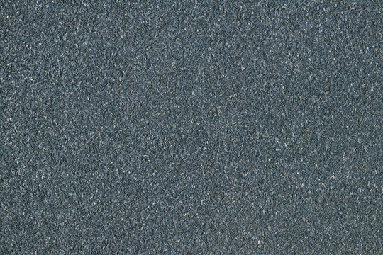 Texture of bituminous coating for the facade of the house. Seamless texture. Bituminous coating with stone texture. Can be used in interior design, in architectural design and construction.