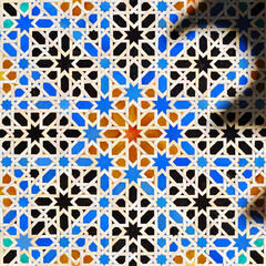 Tiles mosaic of Al Andalus. Seville tiles. Arabic tiles from Spain. Alcazar of Seville. Arab pattern light and shadow decoration