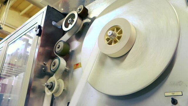 35mm film  washers in cinemas with industrial films.Process developing film 35 mm.Film 35mm production.