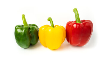 three bell peppers isolated on white background. Fresh vegetables Three sweet Red, Yellow, Green Peppers. vegan food concept. healthy eating