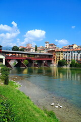 Obraz premium Bassano del Grappa is a city in northern Italy’s Veneto region, Italy. The Old Bridge also called the Bassano Bridge or Bridge of the Alpini is considered one of the most picturesque bridges in Italy.