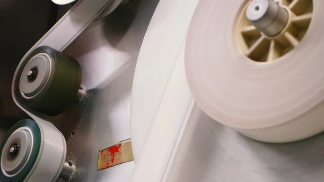 35mm film  washers in cinemas with industrial films.Process developing film 35 mm.Film 35mm production.