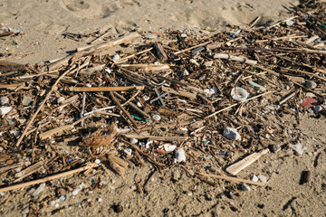 Micro plastics pollution on dirty sea coast,environmental waste contamination