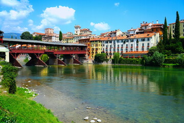 Obraz premium Bassano del Grappa is a city in northern Italy’s Veneto region, Italy. The Old Bridge also called the Bassano Bridge or Bridge of the Alpini is considered one of the most picturesque bridges in Italy.
