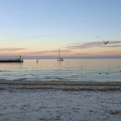 Gdynia beach in the colors of the setting sun, Poland