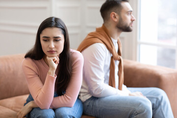 Obraz premium Offended Arab Couple Not Talking After Quarrel Sitting At Home
