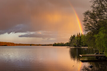 Naklejka na ściany i meble Rainbow over lake