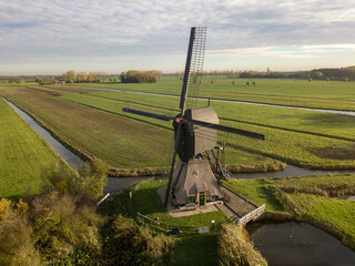 Windmill in a typical Dutch landscape