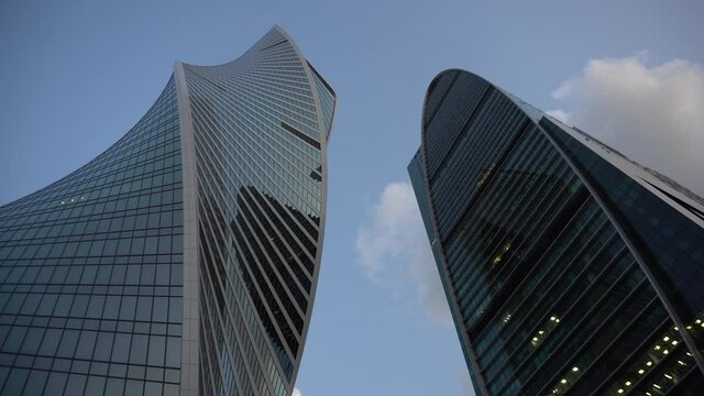 Two newly built skyscrapers. Skyscrapers are in Moscow city. View from below.