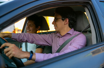 Learning to drive. Two young men in a driving session