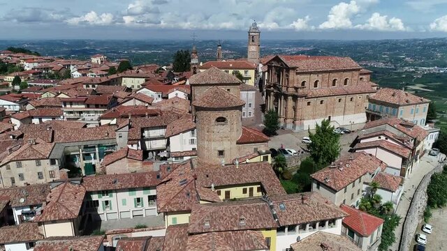 Aerial view of La Morra is a comune in the Province of Cuneo in the Italian region Piedmont known for the famous Barolo wines showing the small town and the typical hill landscape in background 4k