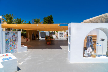 Traditional Greek gallery with hand made souvenirs at Santorini island in Greece