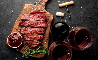 Dinner for two .Various degrees of roasted beef steak in the shape of a heart with spices and...