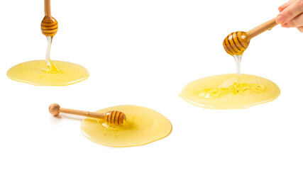 Dipper with honey on a white background.