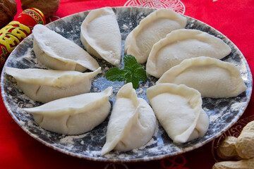 Freshly wrapped dumplings close up. Chinese food.
