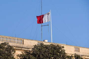 Official Flag of the State of Malta waving in the wind