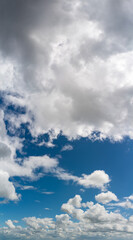 Fantastic clouds against blue sky, panorama