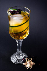 Fresh cocktail decorated with cucumber and ice