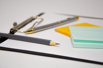 pen stickers office tablet lies on white background