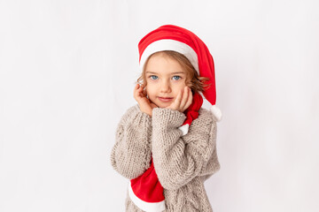 little girl in Santa hat on white background, space for text