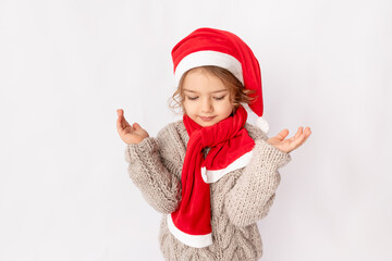 little girl in Santa hat on white background, space for text