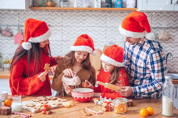 Happy family bake cookies for Christmas