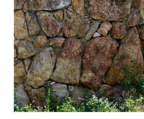 Old Armenian stone - tuff wall made