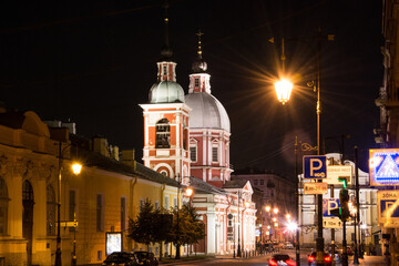 Fototapeta na wymiar Night view of a big city street. the lantern shines brightly. Road and street of the night city.