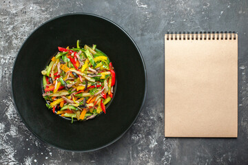 top view delicious vegetable salad inside plate on the grey background color photo meal health food