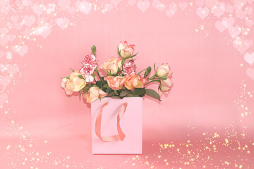 Concept for Valentine's Day or Women's Day. Postcard, hearts and flowers in gift boxes on a pink background, place for text, banner, Happy holidays, congratulations, birthday, wedding, selective focus