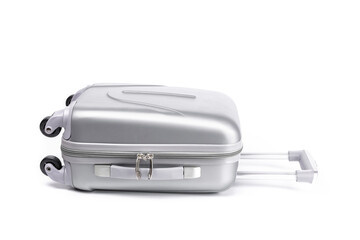 Travel suitcase isolated. Silver plastic luggage or vacation baggage bag on white background. Design of summer vacation holiday concept.