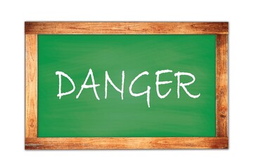 Obraz premium DANGER text written on green school board.