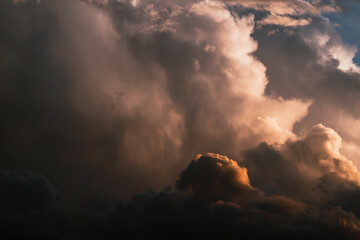 The rain forming within the cloud. Dramatic sky with powerfull clouds.