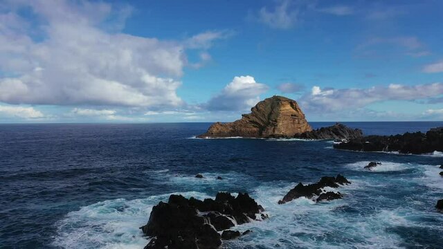 An aerial view. Drone. Landscape with the sea and picturesque shore. From above drone view of picturesque sea bay with rocky cliffs on mountainous coast with green hills.