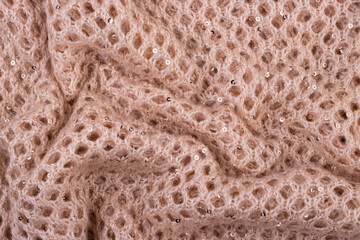 crumpled mesh wool scarf texture close-up for background