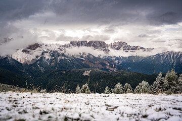 landscape with snow covered mountain range in puez-geisler national park