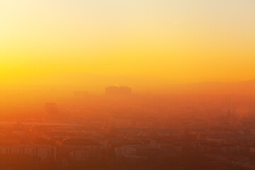 Obraz na płótnie Canvas Fog over the city in the twilight