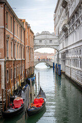 Bridge of Sighs in Venice with gondolas