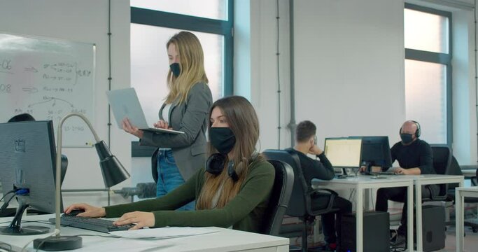 MS Office workers wearing masks during pandemic