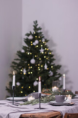 Beautiful christmas composition with a candles, decorations on textured table. Close up, copy space, background.