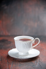 front view cup of tea on dark background ceremony drink glass photo