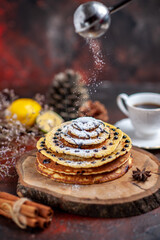 front view tasty sweet pancakes with tea on dark background milk dessert sweet