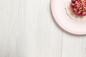 top view little cake with grapes inside plate on white background fruit biscuit cake