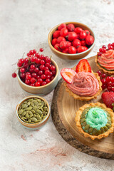 front view creamy cakes with fruits on white background sweet dessert biscuits